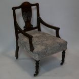 A Victorian inlaid mahogany chair