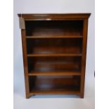 A 20th century mahogany open bookcase, H.104 W.80 D.25cm