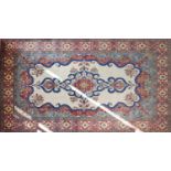A Central Persian Isfahan carpet, central double pendent medallion on an ivory field within multi-
