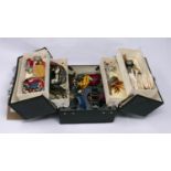 A black leather jewellery box containing a variety of costume jewellery to include earrings,