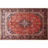 A Central Persian Kashan rug, central double pendent medallion with repeating petal motifs on a