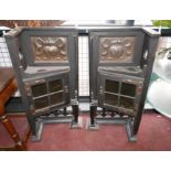 A pair of Arts and Crafts ebonized corner cabinets, inset with copper panels, H.93 W.50 D.30cm