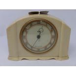 A vintage, Smiths, '30 hour' clock in a stepped cream plastic case, the circular dial and gilded