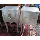 A pair of contemporary silvered side chests of two drawers, raised on cabriole legs, H.72 W.40 D.