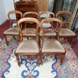 A set of six Victorian mahogany dining chairs