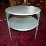 A circular pale green metal Aviators 2 tier coffee table, H.63 D.61cm