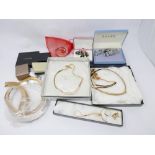 A collection of boxed vintage costume jewellery to include Christian Dior, Monet, Pierre cardin, etc