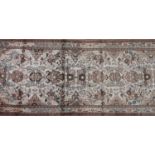 A North West Persian Sarouk runner, repeating stylised floral motifs with repeating floral and