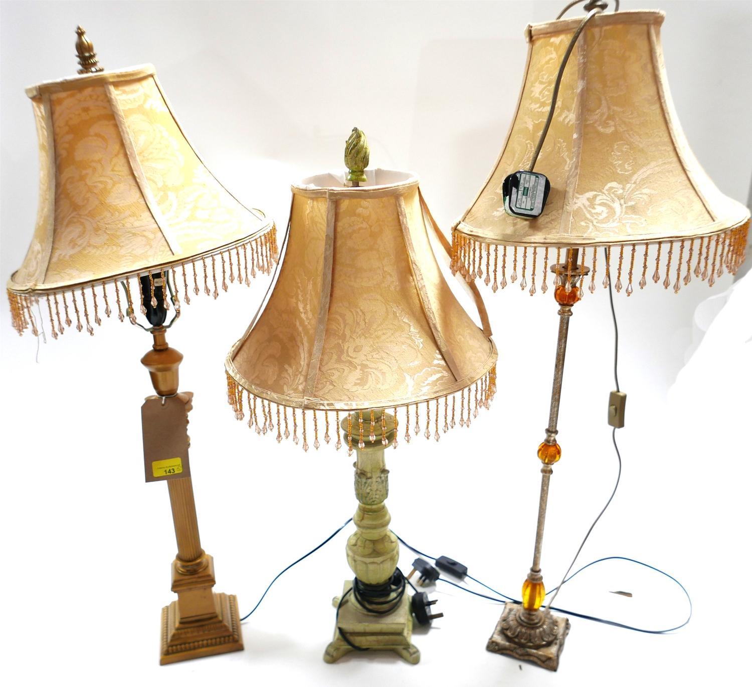 Three various table lamps with matching shades. Tallest 95cm