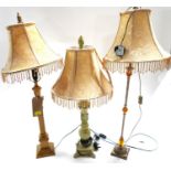 Three various table lamps with matching shades. Tallest 95cm