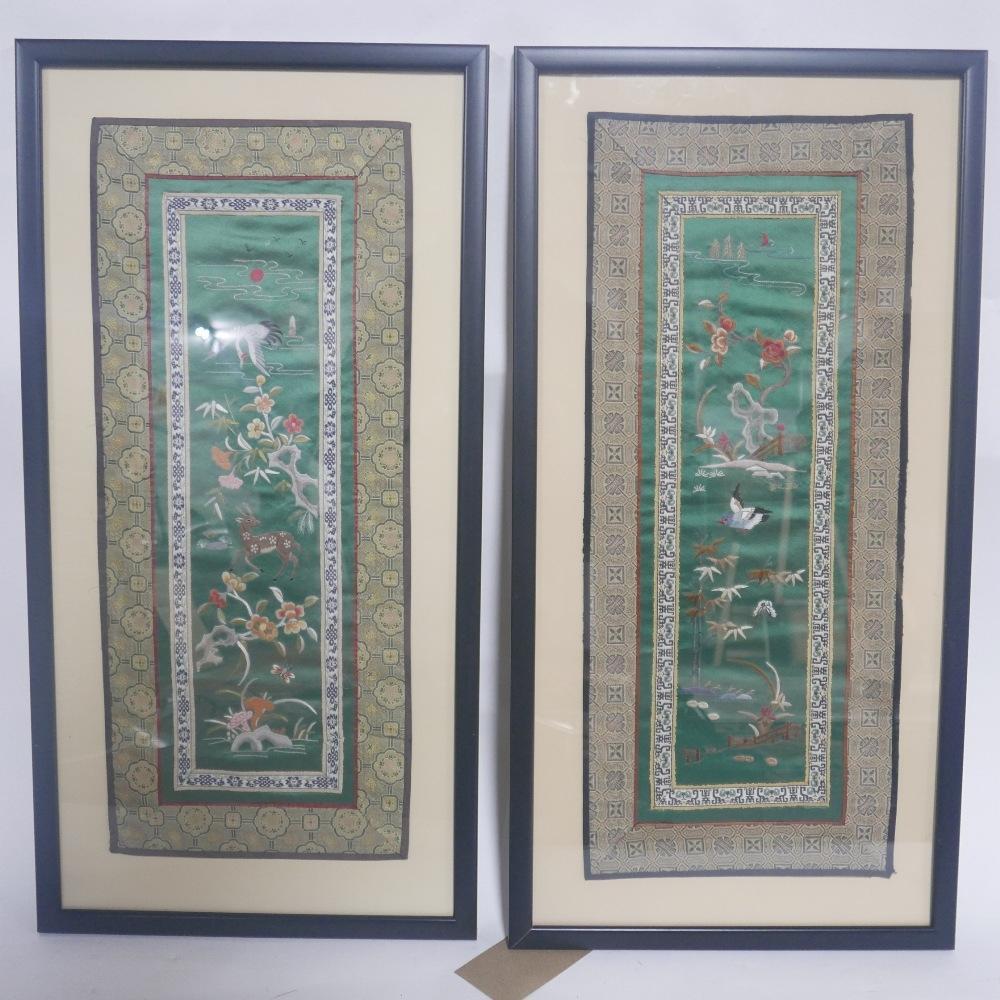 A pair of early 20th century Chinese silk embroidered panels, framed and glazed, 61 x 25cm