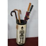 A 20th century cylindrical papier mache and leather bound Fornasetti style stick stand, with