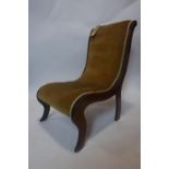 A Victorian Cuban mahogany slipper chair, with green velour upholstery