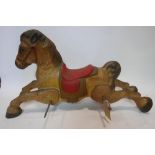 A metal carousel horse, with frame (no bolts), L.98cm