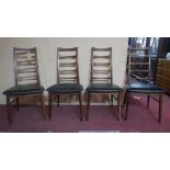 A set of four mid 20th century Danish exotic hardwood 'Lis' dining chairs, by Niels Koefoed