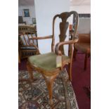 A set of eight Queen Anne style burr walnut dining chairs to include two carvers