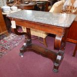 A 19th century French Louis Philippe flame mahogany console table, with gray marble top, scroll