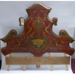 A 19th century Venetian scarlet and gilt painted bedhead