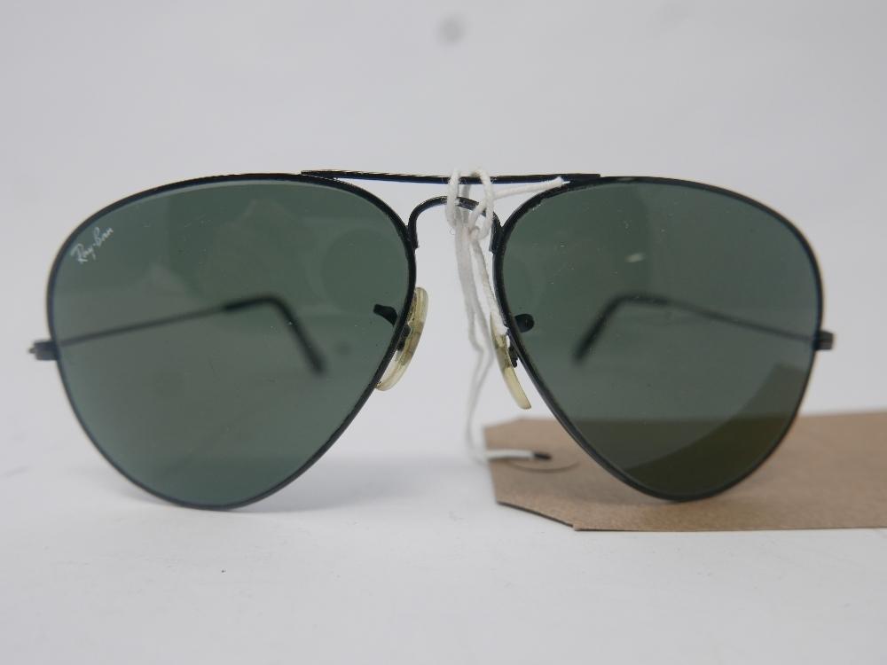 A cased pair of vintage, Ray-Ban sunglasses
