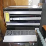 A Bang & Olufsen sound system to include ampitiuner Beomaster 5500, CD Beogram CD 50, Beocord 5500