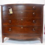 A Georgian inlaid mahogany bow front chest of four drawers, on bracket feet, H.93 W.103 D.55cm