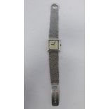 A 1970's Roy King silver wristwatch, square textured dial signed, the textured silver bracelet
