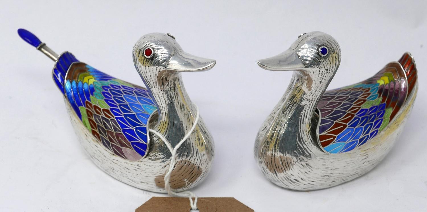 A pair of Korean, 99 silver and brightly-coloured enamel salts of duck form, one with enamelled