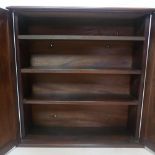 A 19th century mahogany tilt top cabinet, with key, H.71 W.69 D.19cm