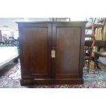 A late Victorian mahogany side cabinet, raised on stepped base, H.107 W.110 D.37cm