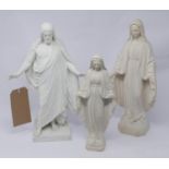 A Royal Copenhagen bisque porcelain figure of Jesus, fingers broken, together with two other