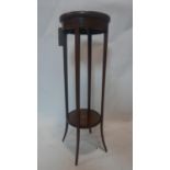 An Edwardian mahogany two tier jardiniere stand, with marquetry inlay, raised on splayed legs, H.