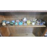 A collection of glass paperweights