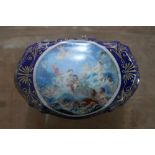 A Continental porcelain box, the lid with central printed image of angels and cherubs in the clouds,