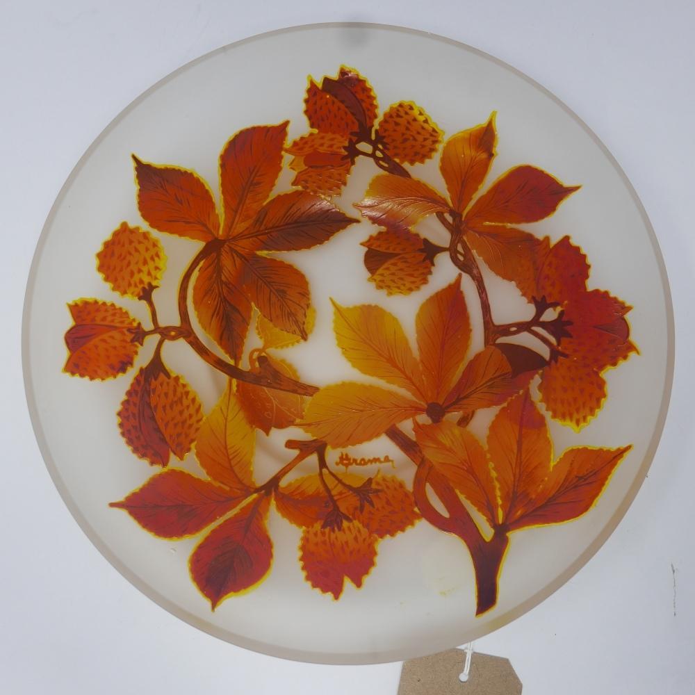 A Czech glass dish, c.1970's/1980's, decorated with autumnal leaves, indistinctly signed, Diameter