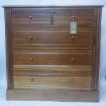 A late Victorian satinwood and walnut chest of two short over three long drawers, H.102 W.103 D.47cm