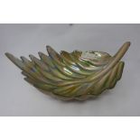 A green lustre glass leaf shaped fruit bowl. L.38cm