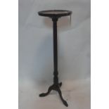 A Georgian style mahogany jardiniere stand raised on ball & claw feet