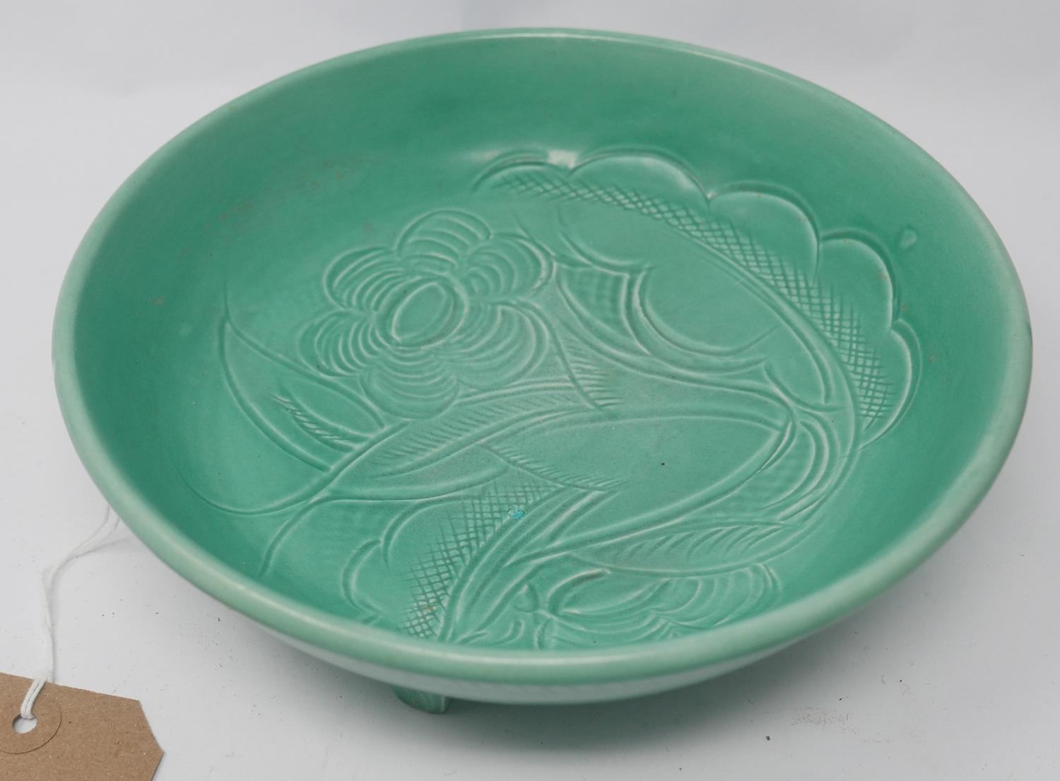 An Art Deco Susie Cooper green glazed bowl, floral design, signed and dated 1932 to base, H.7cm