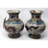 A pair of 19th century Chinese brass cloisonne vases, decorated with dragons chasing flaming