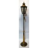 A brass standard lamp in the form of a street lantern. H.173cm