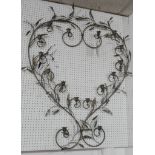 A metal and wirework heart shaped floral wall sconce H.124cm