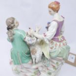 A 19th century Meissen porcelain group of a romantic couple on a walk, H.19cm