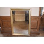 A contemporary gilt framed wall mirror, 106 x 75cm