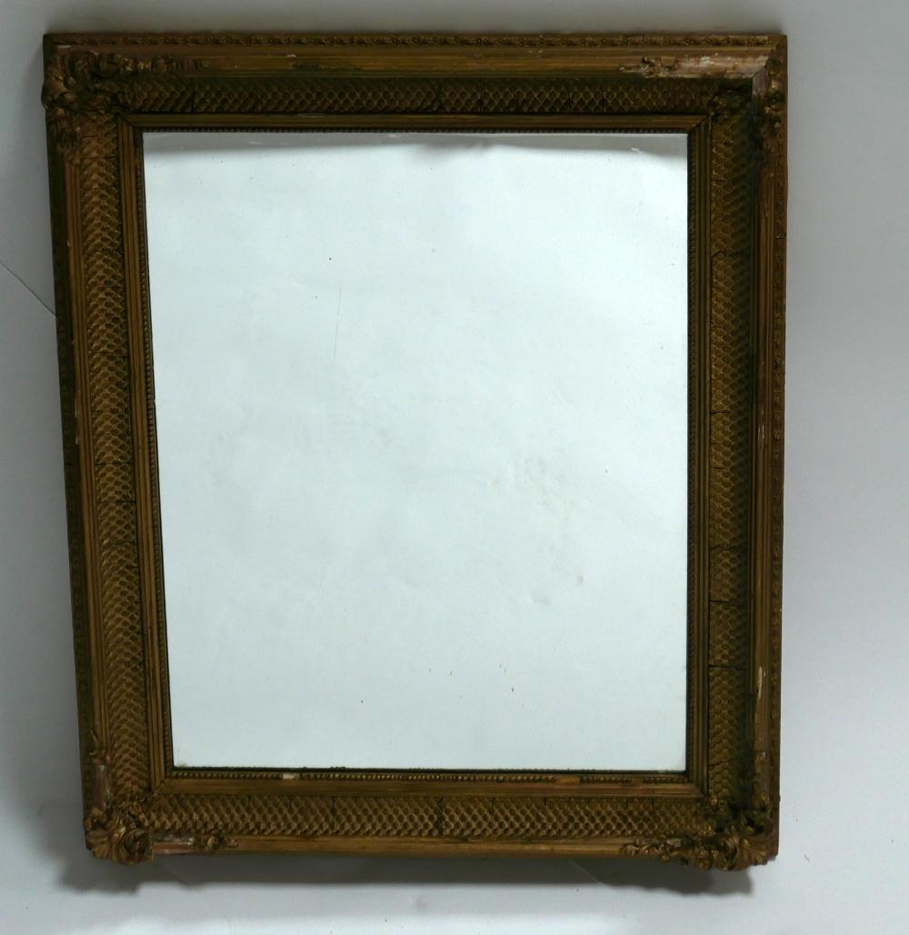 An early 20th century giltwood mirror, some breaks to gilt, 53 x 65cm
