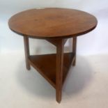 A 19th century pine cricket table, H.58cm