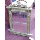 An early 20th century Adam's style gilt wood mirror with bevelled plate, 88 x 71cm