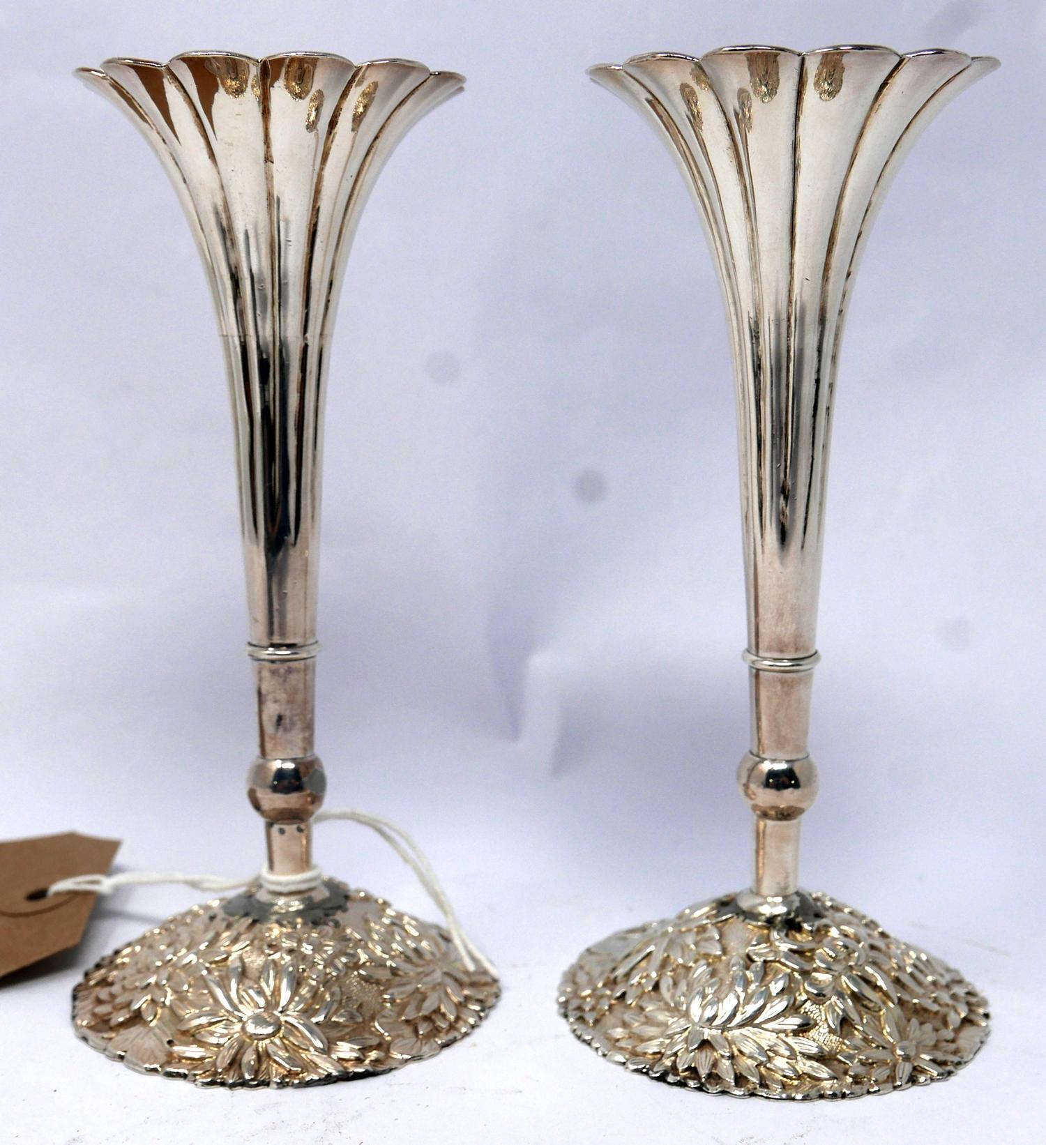 A pair of Chinese silver candlesticks, H.13cm