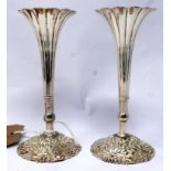 A pair of Chinese silver candlesticks, H.13cm