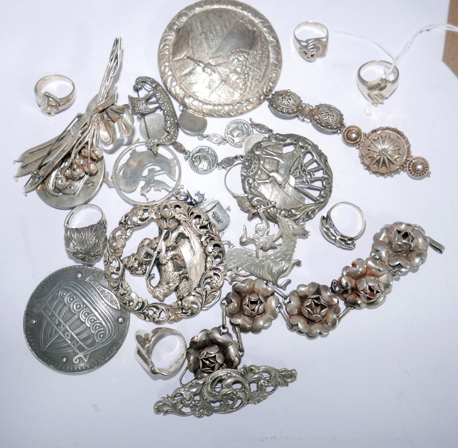 A collection of 20th century silver and white metal Scandinavian jewellery to include brooches,