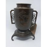 A 19th century Chinese bronze vase on stand, with character marks to base, H.26cm